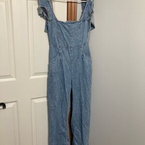 We the free sleeveless denim jumpsuit
Open back 
Size medium